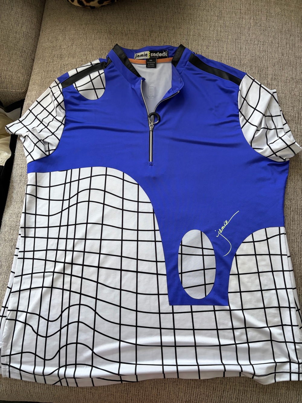 Jamie Sadock royal blue, black and white golf shirt